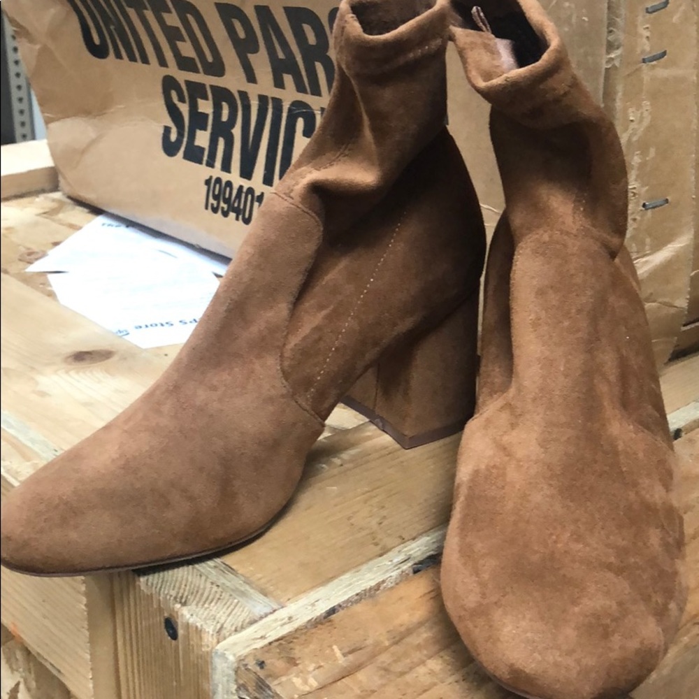 Shoes never worn. Too small for me